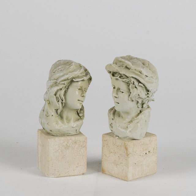 Pair of half-length figurines of him and her made of resin with stone base second half of the 20th century measures 7 x 7...