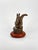 Stockpiling is an original lost-wax bronze sculpture by Franco Vianello, capturing the charm and character of a squirrel...