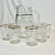 Offering a Pitcher and glassware juice set from the 1950s. It’s transparent clear glass with gold bands. Additionally...