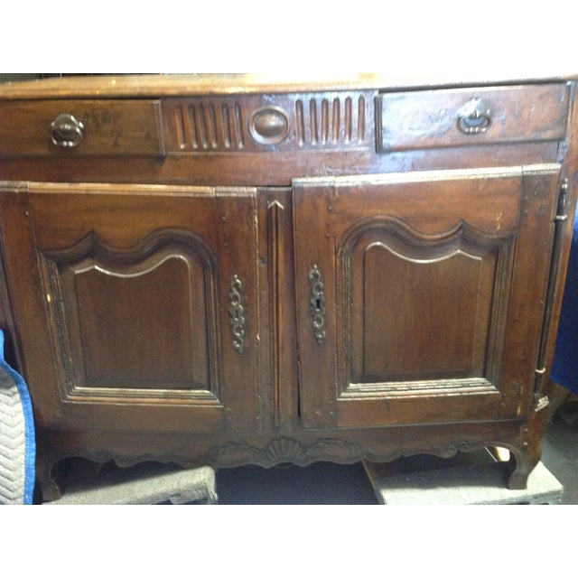 Beautiful, rich colored French sideboard was purchased in France. Two drawers, two doors below with shelves inside....