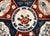 A beautifully hand-painted Japanese Imari-style porcelain plate dating from the late Meiji to early Taishō period (circa...
