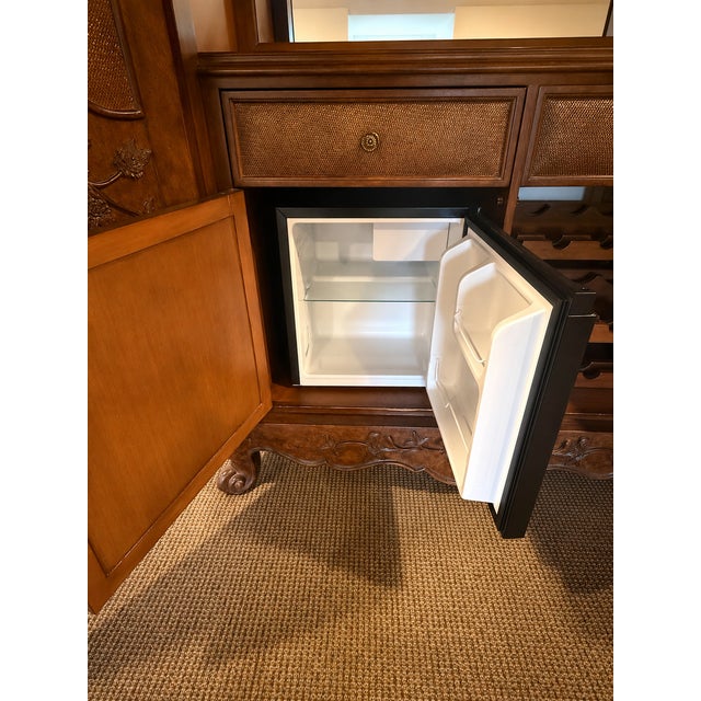 Monumental Carved Wood Home Bar Armoire With Mirrored Interior, Wine Storage & Mini Fridge For Sale - Image 12 of 14