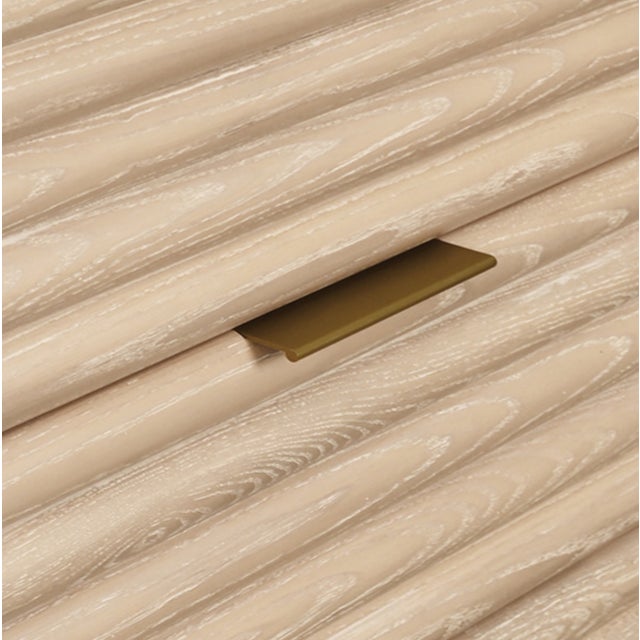 New special order item. Not vintage. Elegant four-drawer chest crafted from cerused oak with striking horizontal reed...