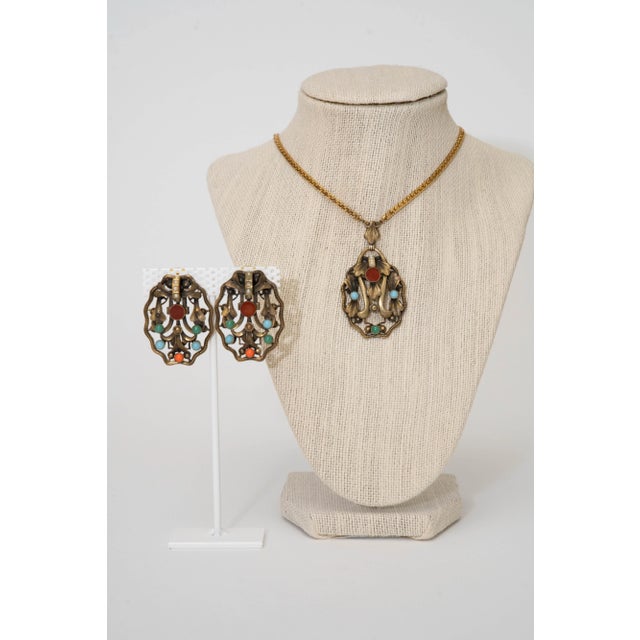 This lovely vintage gold filled and semi precious pendant necklace and pierced earring set is art nouveau style and and...