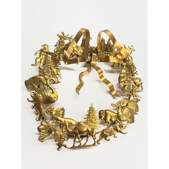 Marvelous vintage Petit Choses Dresden wreath made of brass for all holidays with a great brass ribbon. Animals and humans...