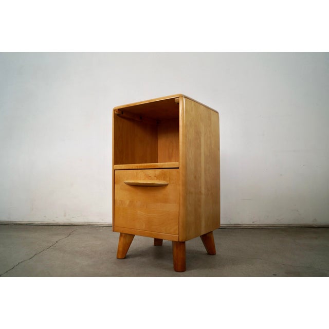 Vintage 1940's Art Deco nightstand for sale. It was manufactured by Heywood Wakefield in the 1940's, and is the highly...