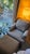 Presenting an exceptional, bench-made stationary lounge chair and matching ottoman from the prestigious "Tyler" Custom...