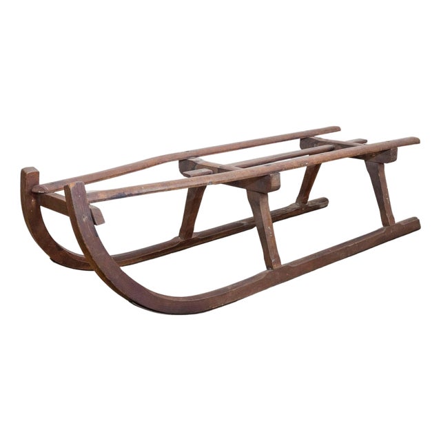 Rustic 19th Century French Wooden Sled with Weathered Patina and Curving Base For Sale