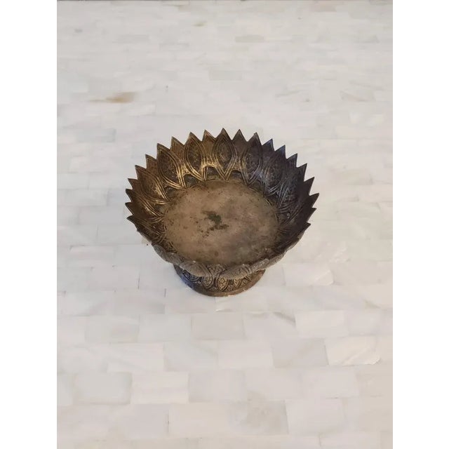 An exceptionally rare early 19th century Thai solid silver votive offering cup / niello bowl, finely hand-crafted, in...