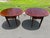 Beautiful matching pair of classic mahogany drop-leaf accent tables featuring rich wood grain, a convenient storage...