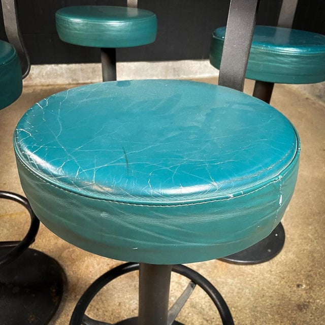 These vintage bar stools are perfect for a bar or as a statement at home. The crutches are equipped with a green leather...