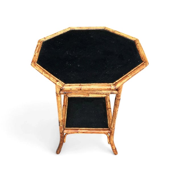 This striking vintage bamboo side table beautifully captures the relaxed sophistication of British Colonial, Coastal, and...