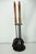 Beautiful vintage Mid-Century Modern fireplace tool set featuring long sculpted wood handles, brass collars, and black...