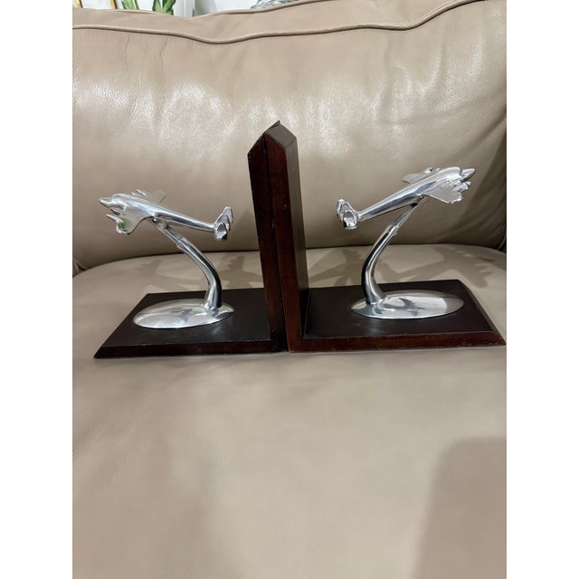 Showcase your passion for classic aviation! These meticulously crafted airplane bookends stylishly organize your...