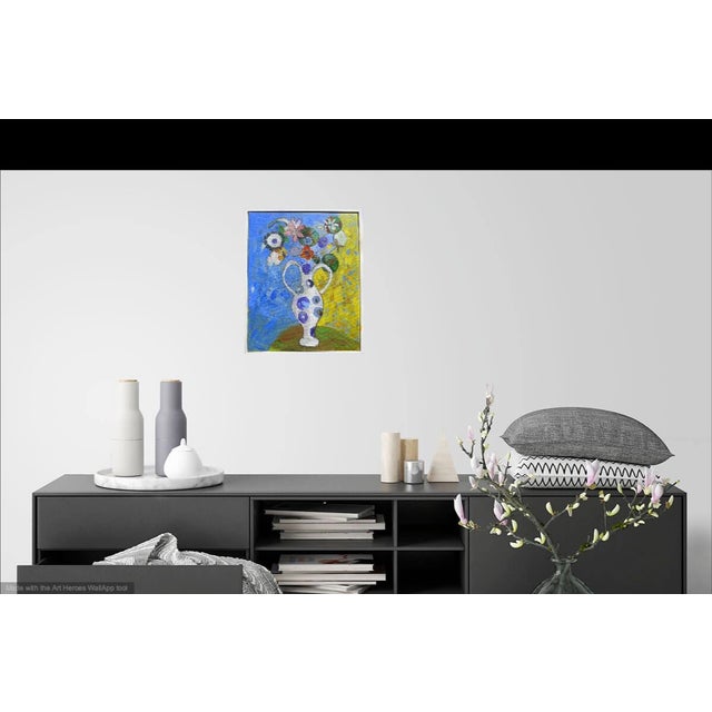 Bright and vibrant oil painting on canvas. The painting is of a beautiful bouquet of flowers in a sculptural vase. All of...