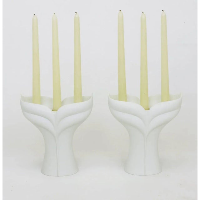 Pair of white matte porcelain three-light candelabrum by Uta Feyl for Rosenthal Studio Linie. Sometimes referred to as...