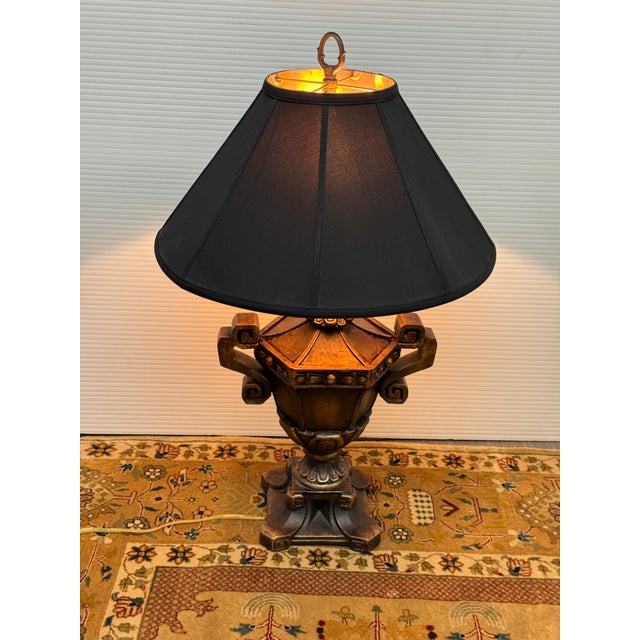 Design Plus Gallery presents an Urn Shaped Neoclassical Table Lamp. This antique bronze finish table lamp in the...