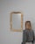 This 1880s French wood patinated mirror offers a refined balance of simplicity and historic charm, defined by its gently...
