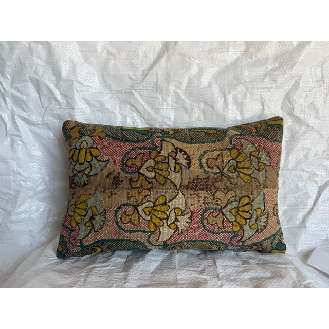 This exceptional antique pillow is fashioned from a 17th-century Italian Florentine wool and silk textile, presenting a...