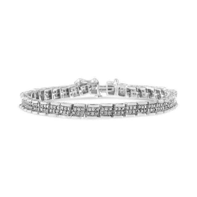Elegant and timeless, this gorgeous sterling silver link bracelet features 2.0 carat total weight of round, rose cut,...
