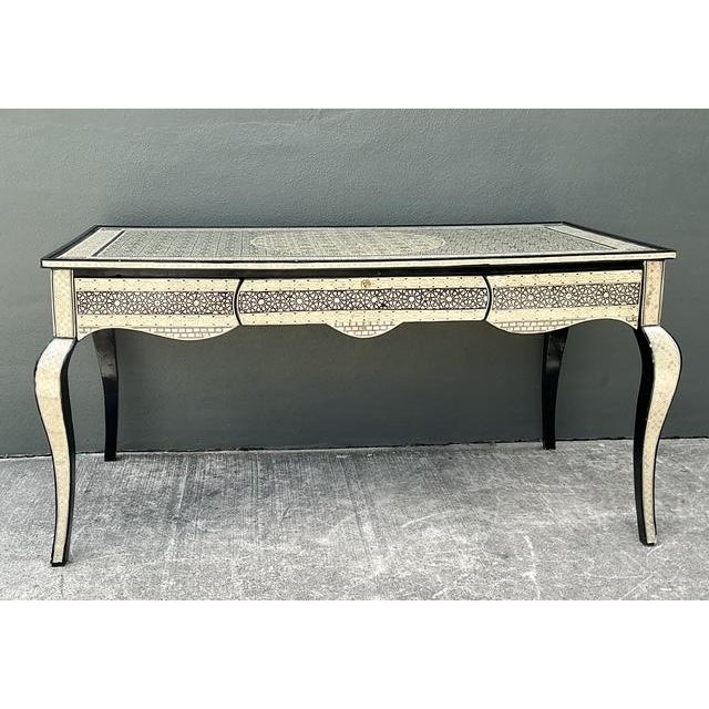 This breathtaking luxury writing desk is a masterpiece of artisanal craftsmanship, channeling the storied traditions of...