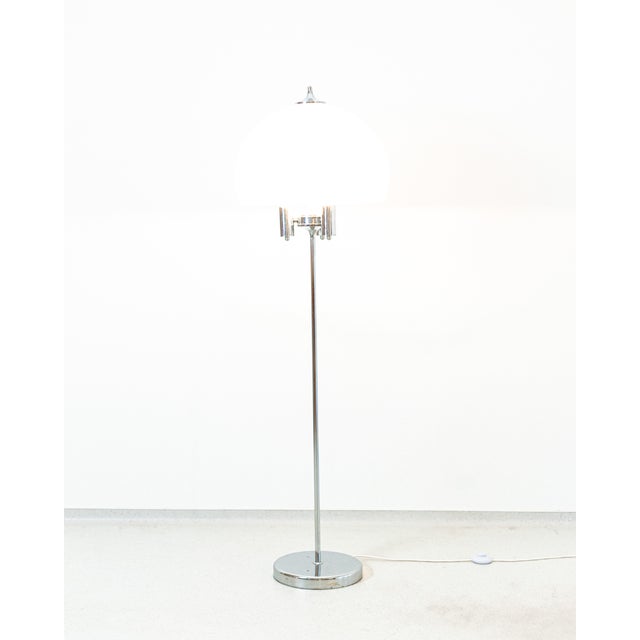 Chrome Floor Lamp with Large Acrylic Glass Shade, 1970s, in Restored conditions. Designed 1970 to 1979 This piece is...