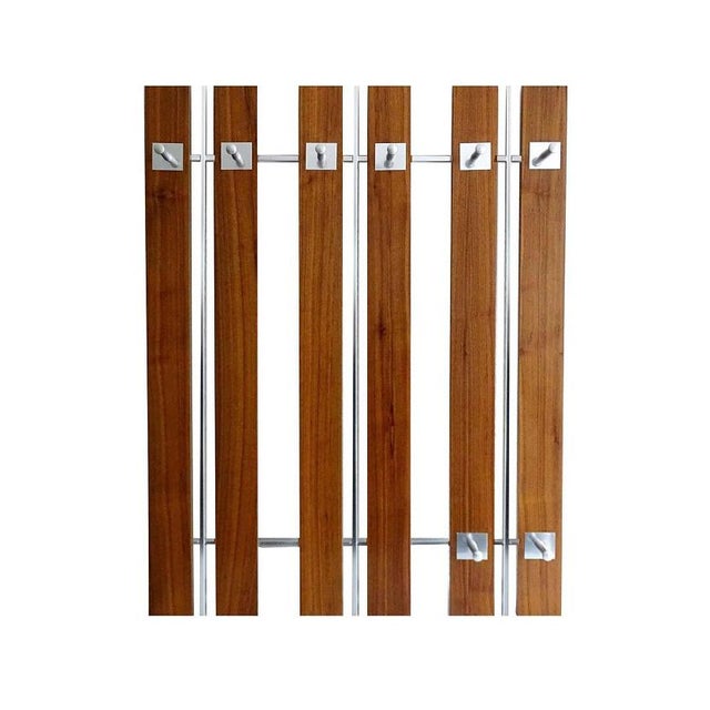 Large danish style mid-century coat rack, it is made of an aluminium structure with large rectangular wooden beam with...