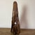 Naïve sculpture of a bearded man carved from hand-carved root wood, folk art. What distinguishes folk art is its deep...