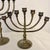 Mid-20th Century Trio Variegated Height Brass Menorahs For Sale In Raleigh - Image 6 of 12