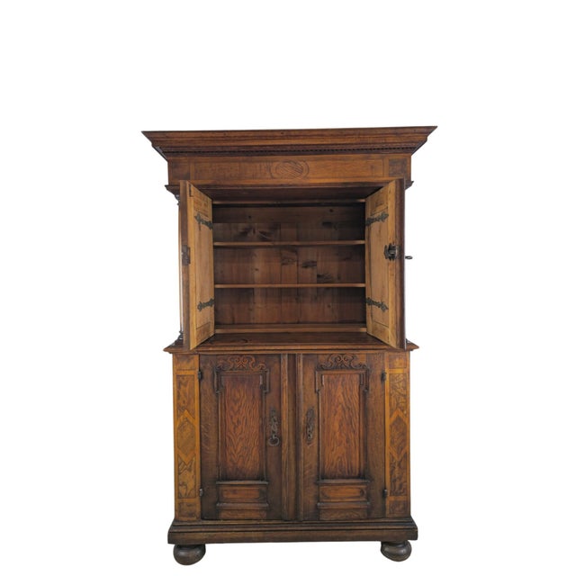 Renaissance-style buffet (Anrichte), Germany, 19th century. Oak case with walnut and other hardwood inlays. Two parts. The...