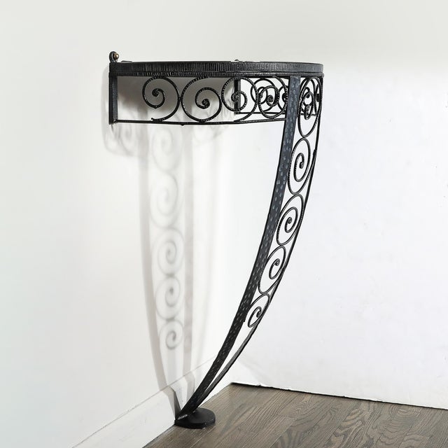 This elegant Art Deco demilune console table exemplifies the sophistication and craftsmanship synonymous with French...