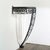 This elegant Art Deco demilune console table exemplifies the sophistication and craftsmanship synonymous with French...
