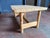 Impressive solid pine dining table with very thick top and rounded legs designed by Knud Friis & Elmar Moltke Nielsen for...