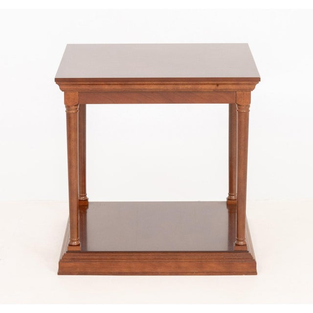 Empire Style Two-Tier Walnut Side Table, with four columnar supports and stepped square base. 24" H x 24" W x 24" D....