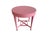 A classic Baker Milling Road accent table featuring a clean round top, tapered legs, and a geometric stretcher base...
