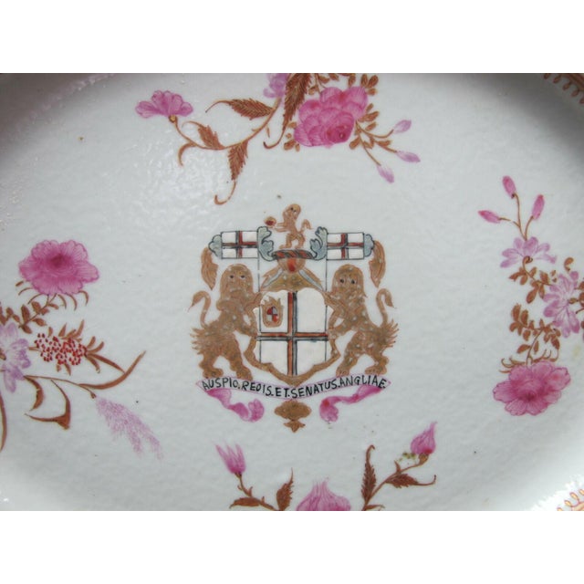 High quality, vintage reproduction Chinese export Armorial porcelain plate with British East India armor and banner. The...
