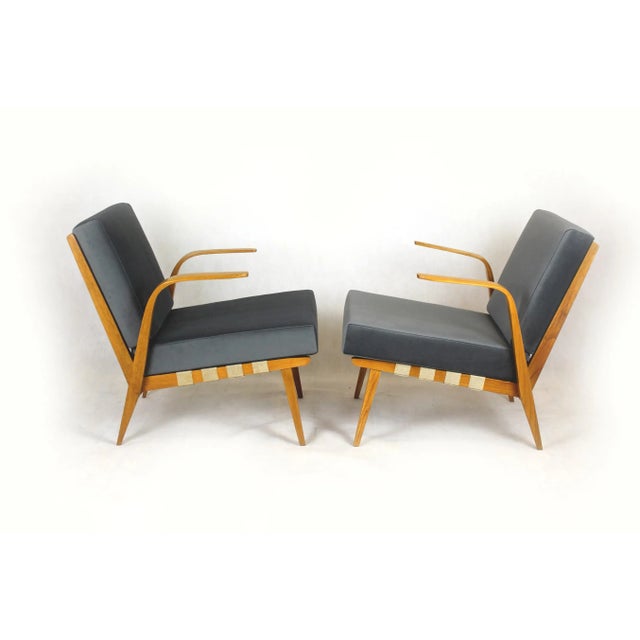 This pair of armchairs was made in 1962 by Drevozpracujici Druzstvo in Czechoslovakia. The armrests are made of bent wood....