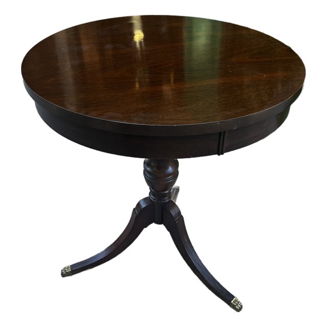 1970s Mid Century Modern Wooden Round Side Table With Brass Claw Feet For Sale