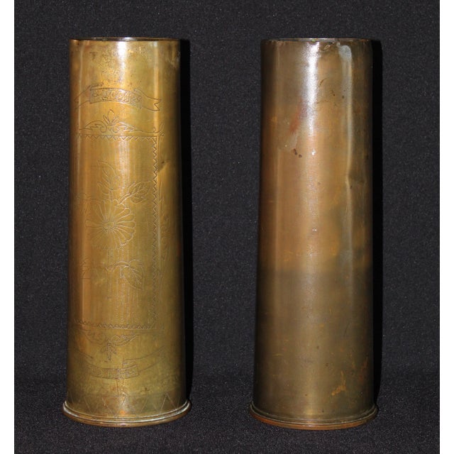 This matching pair of antique brass artillery shell casings dates to the World War I era (circa 1916–1918), based on the...
