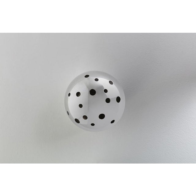 Spherical silver metal vase with holes of different diameters. Production Christofle Period 1950s Dimensions Diam. 13 cm I...