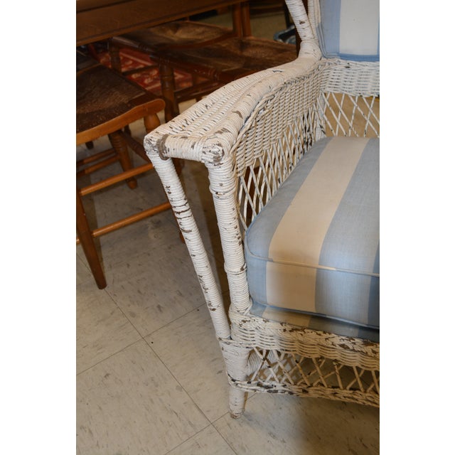 Vintage White Wicker Wing Back Arm Chair W/ Blue Cushions & Coil Sprung Seat For Sale - Image 4 of 18