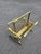 Italian Hollywood Regency Mid-Century ( probably 70s) magazine rack in a patinas squared brass framing. Folding and...