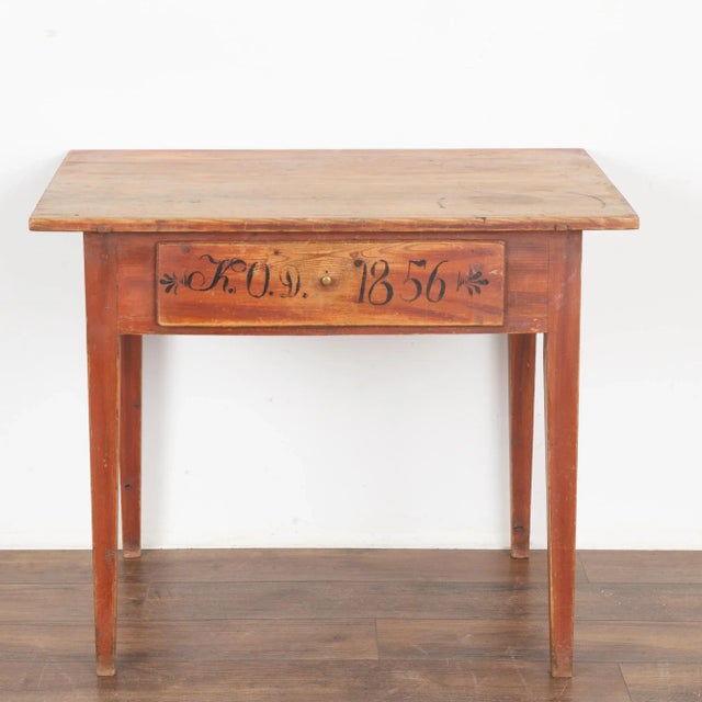 This delightful pine side table comes from the Swedish countryside and still maintains the original faux wood painted...