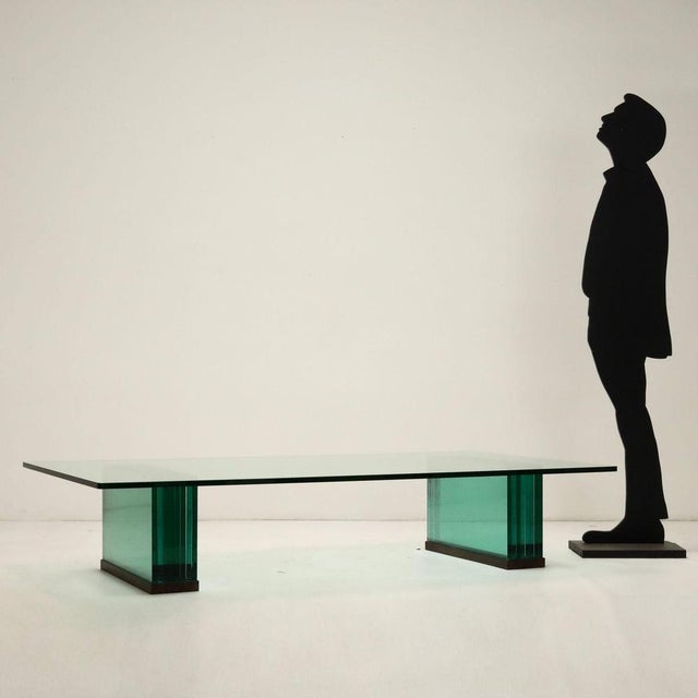 Large coffee table, made entirely of glass sheets. This piece is attributed to the mentioned designer/maker. It has no...