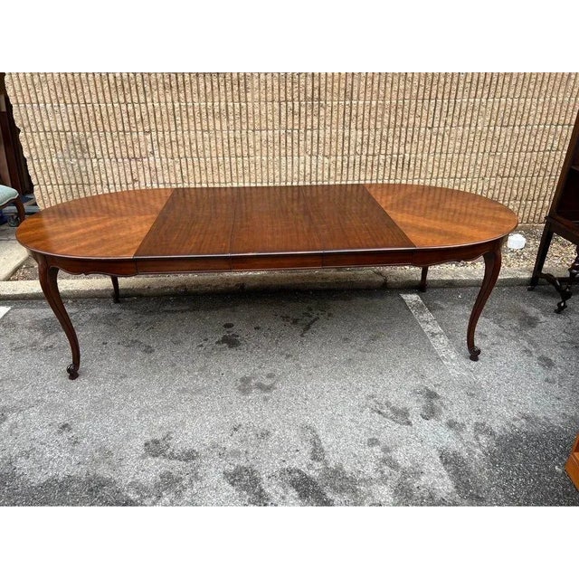 Wood Mid 20th Century Kindel Furniture French Provincial Style Cherry Dining Table With 3 Leaves and Pads. For Sale - Image 7 of 11