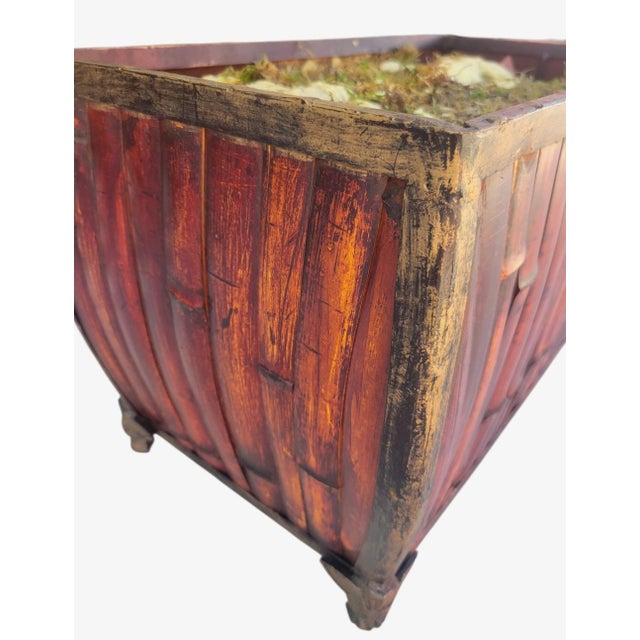 ​Make a dramatic statement with this striking pair of oversized rectangular trough bamboo planters. Masterfully...