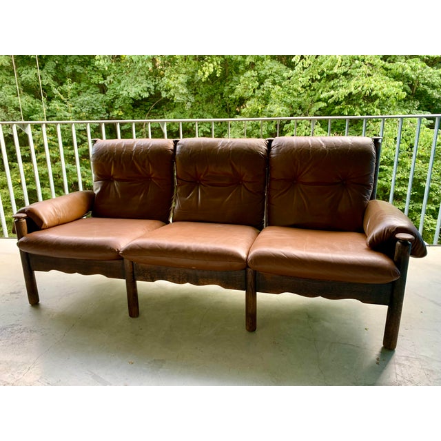 Original from that era. In very good condition, except for the faux leather, which shows some wear (pillow). Covers with...