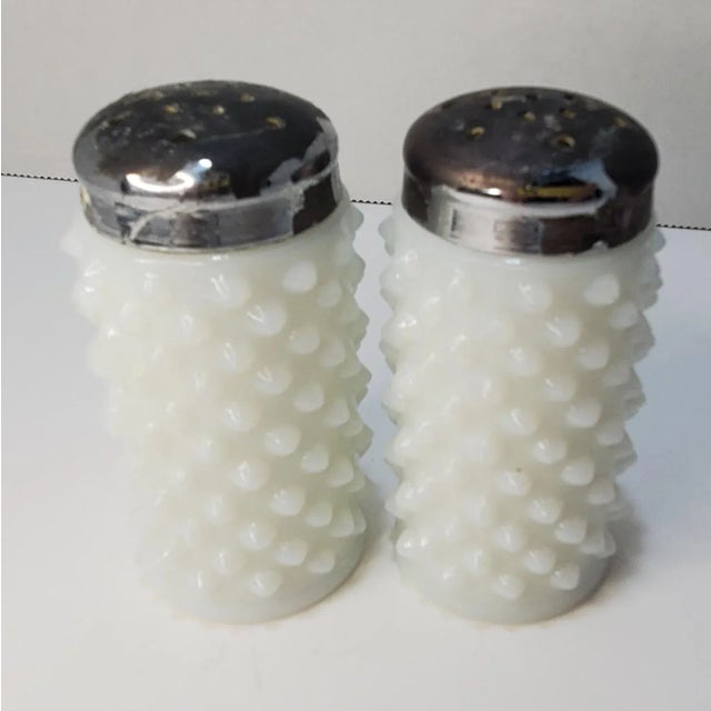 Pattern: Hobnail Color: Milk Glass (fire milk glass) Company: Fenton Date Produced: Mid Century Shape: Salt and Pepper...