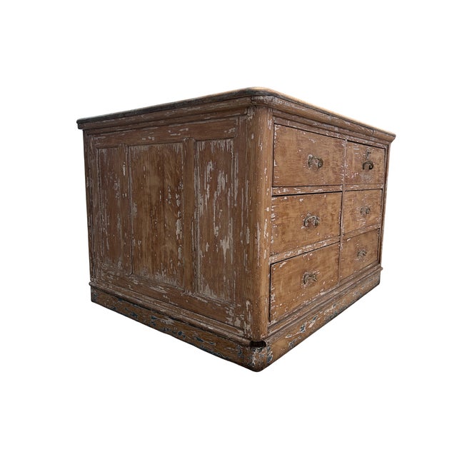 A rare and exceptional antique oak trade counter sourced from France, this substantial piece is as functional as it is...