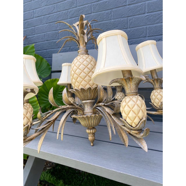 a vintage Quoizel Pineapple Tole Chandelier, a classic example of Palm Beach Regency and Hollywood Regency interior styles...